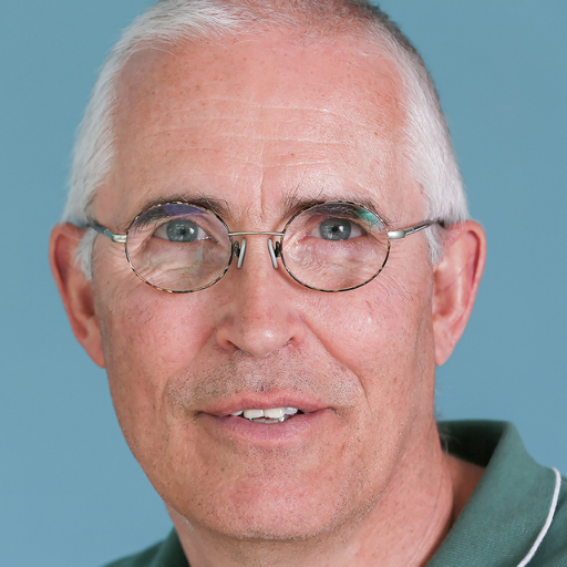 a headshot of Dr. Auwerx