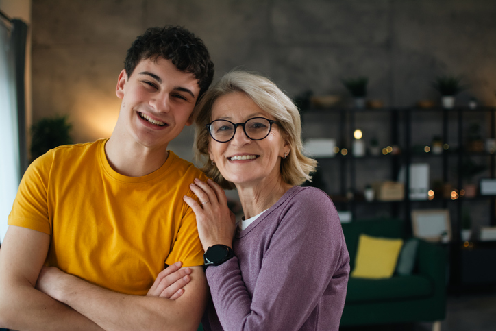 Portrait of mother wearing glasses and son.